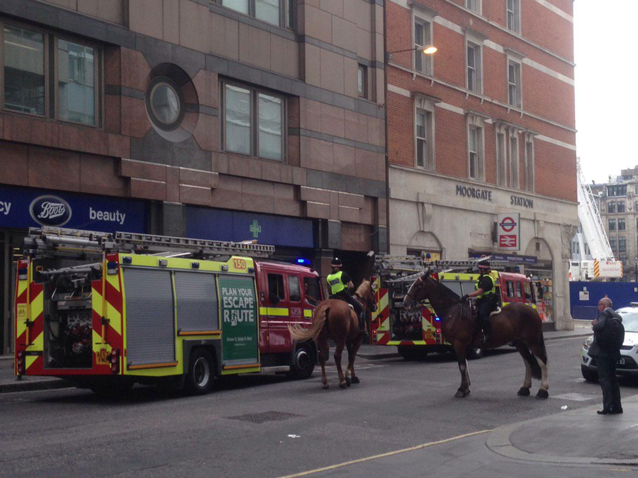 Four fire engines, 21 firefighters and police horses were dispatched to the fire at Moorgate train station