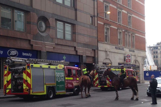 Four fire engines, 21 firefighters and police horses were dispatched to the fire at Moorgate train station