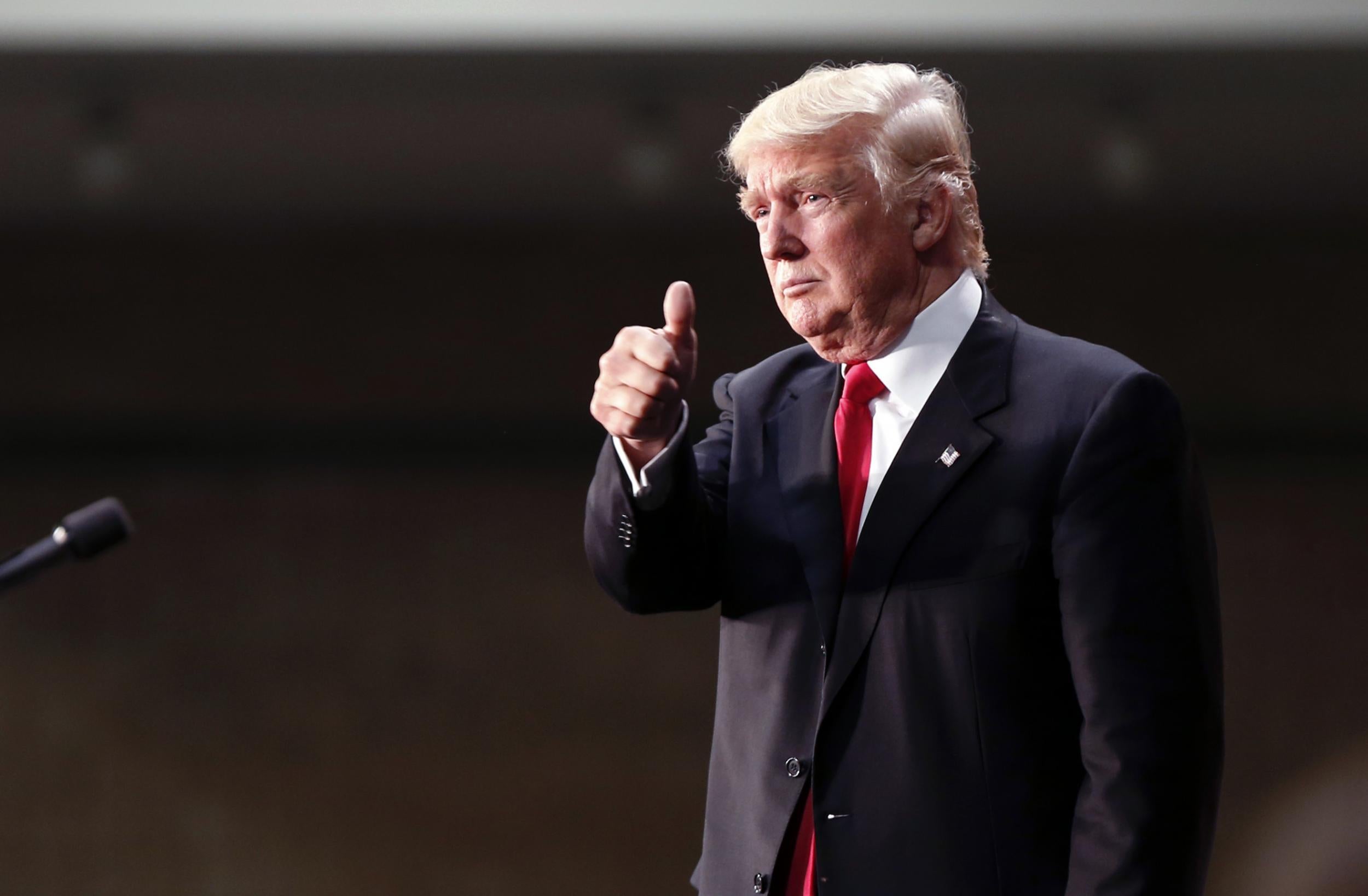 Donald Trump finishes delivering his speech in Charlotte, North Carolina, where he expressed regret for some of his comments earlier in the campaign