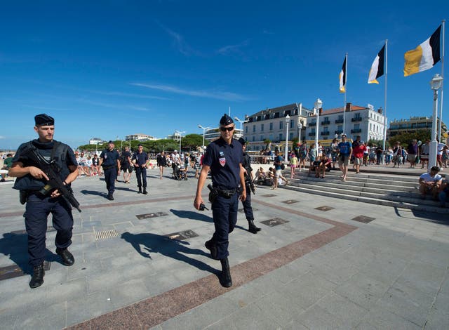 French police officers patrol near the beach of Arcachon, as part of security measures during summer holidays,
