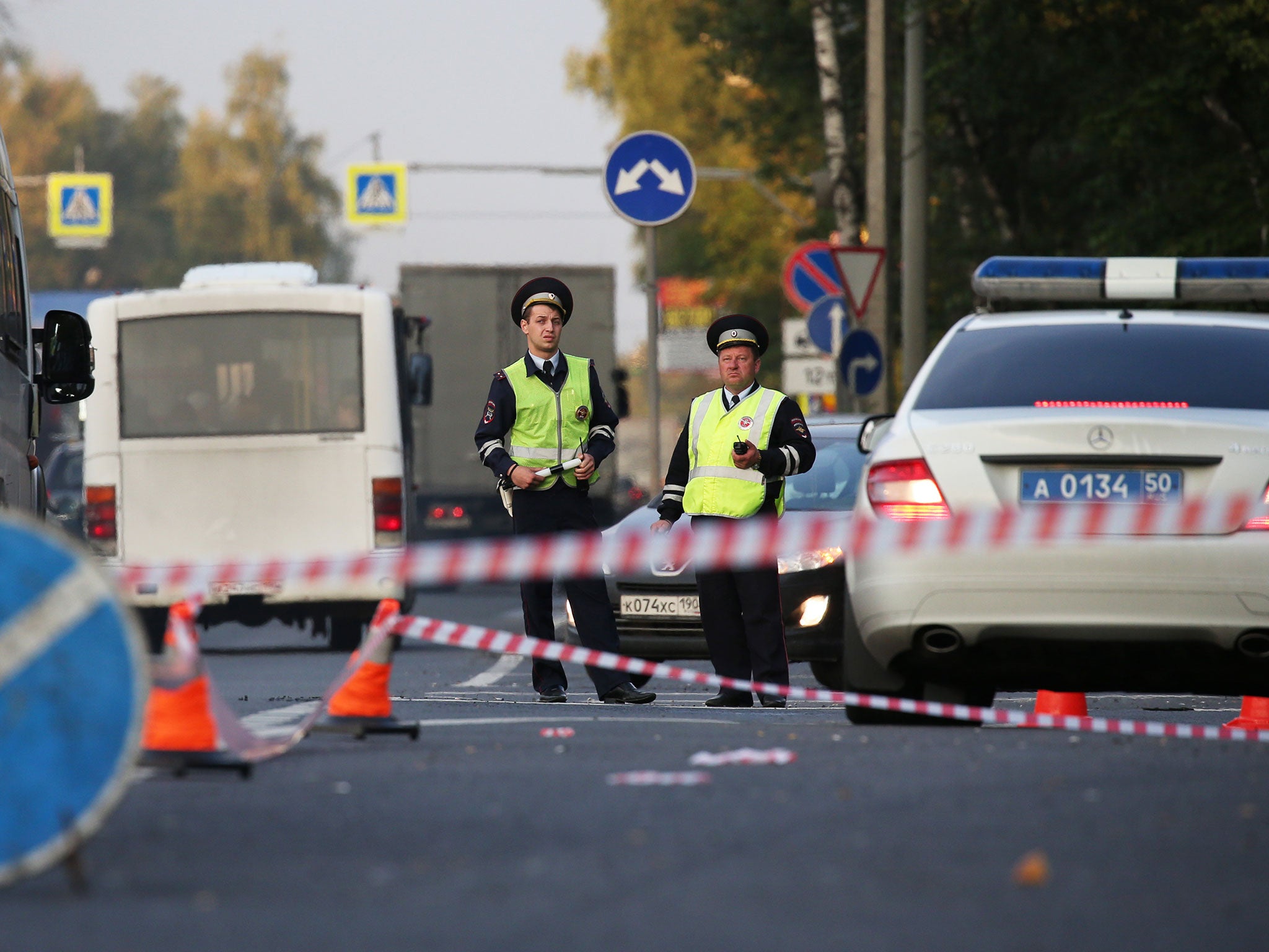 Police officers outside a road police station on the Shchyolkovo Highway in Balashikha, Russia, on 17 August