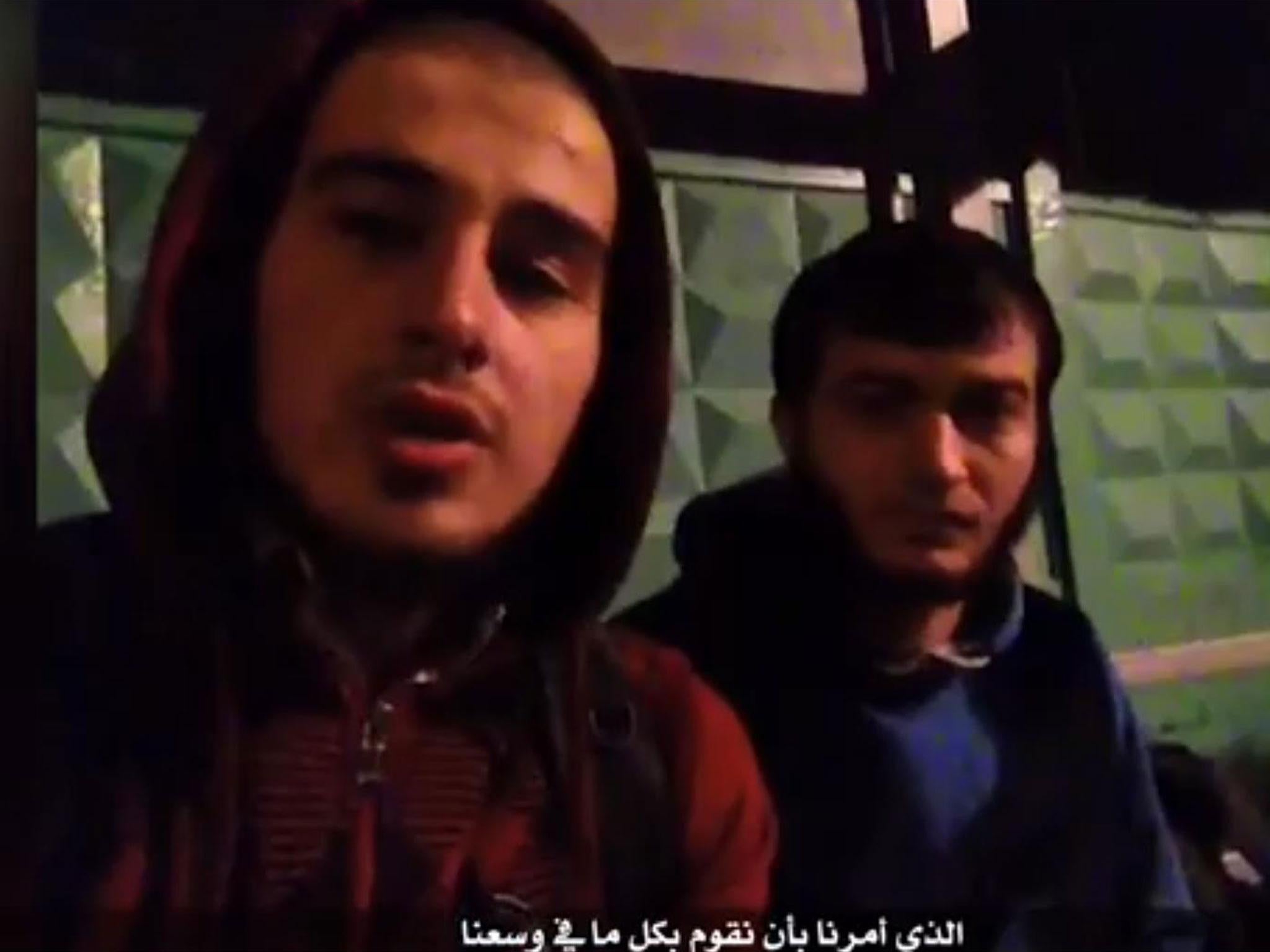 Uthman Mardalov and Salim Israilov pledging allegiance to Isis in a video released by the group's propaganda agency