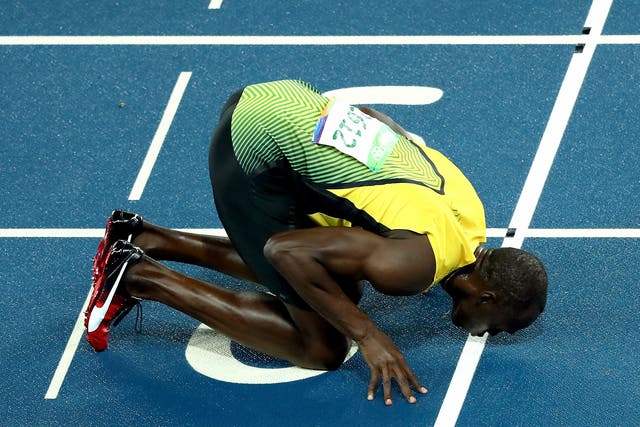 Usain Bolt kisses the finish line in his farewell to running the 200m at the Olympics