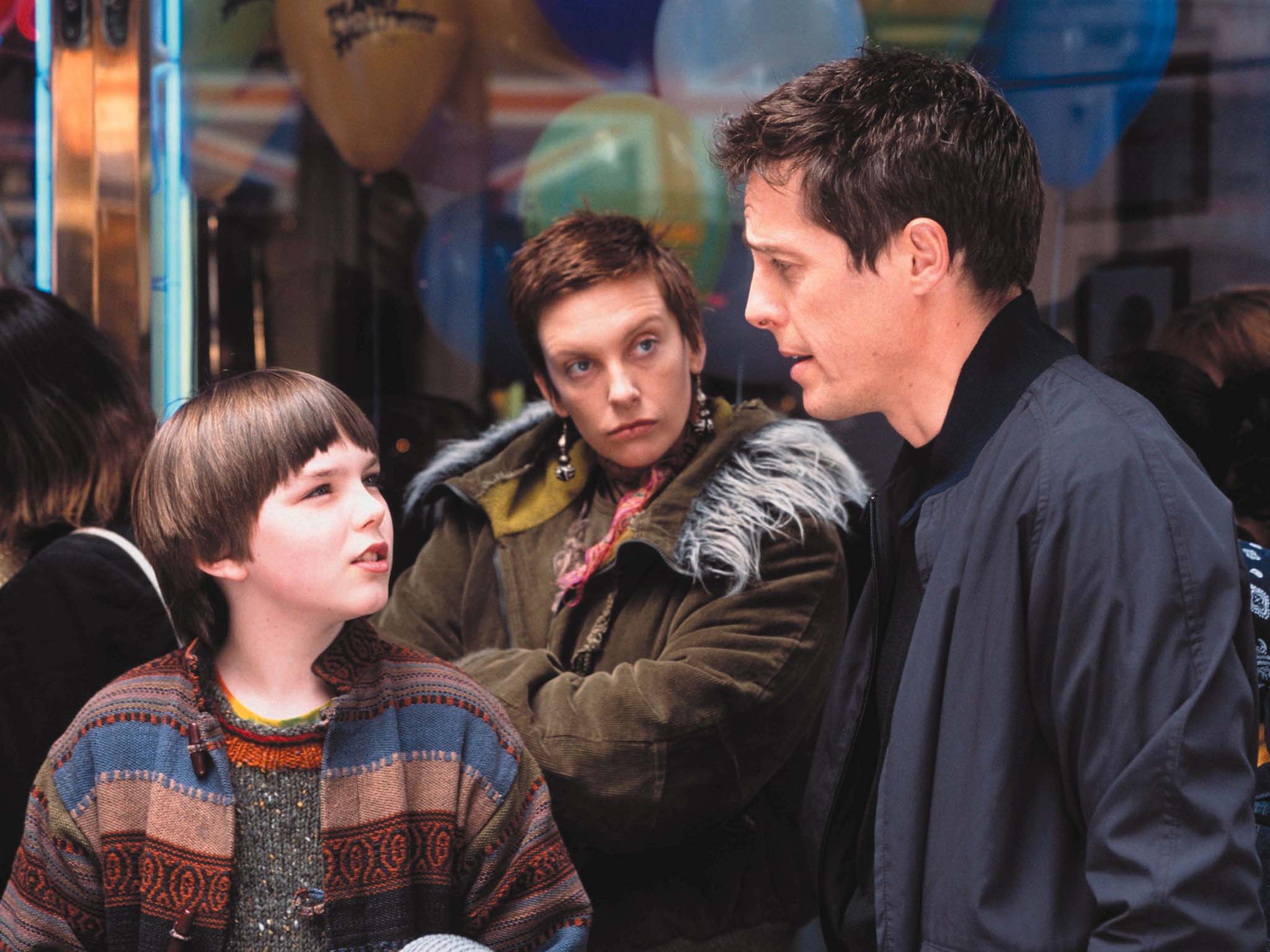 &#13;
Hugh Grant, Toni Collette, Rachel Weisz in ‘About a Boy’ &#13;