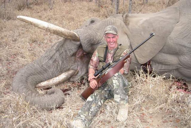 Ian Evans posing with the elephant he shot on safari