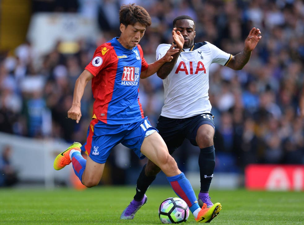 Lee Chung-yong vies with Danny Rose