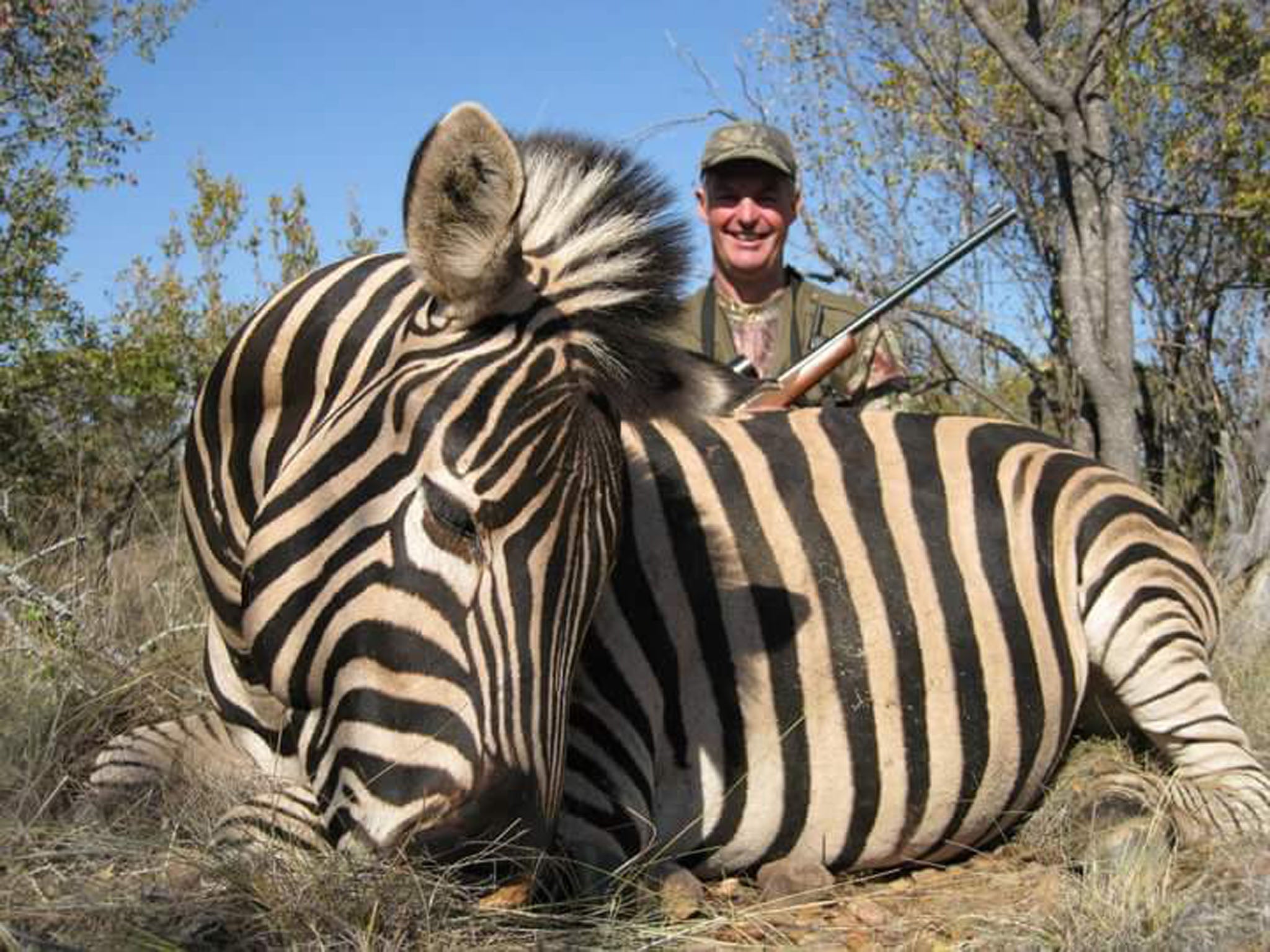 The 62-year-old and a zebra he shot