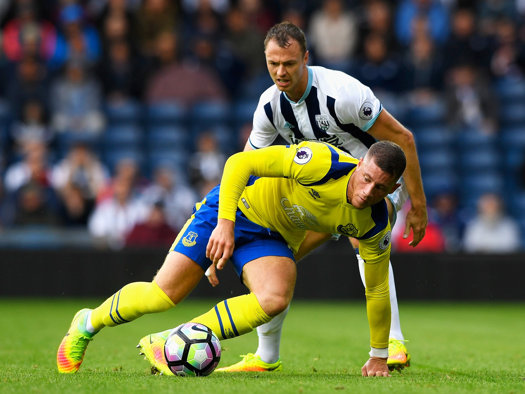 West Bromwich's Evans and Everton's Barkley battle for the ball