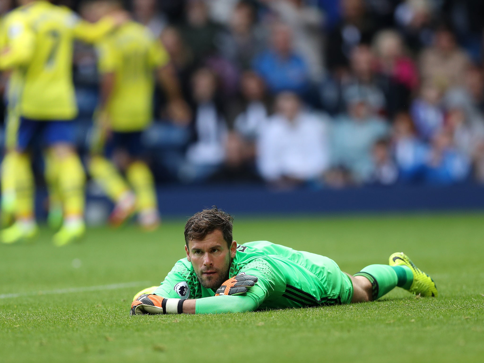 West Bromwich's Foster reacts to being beaten by Barry's strike