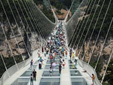 China opens world's 'highest and longest glass bottomed bridge'