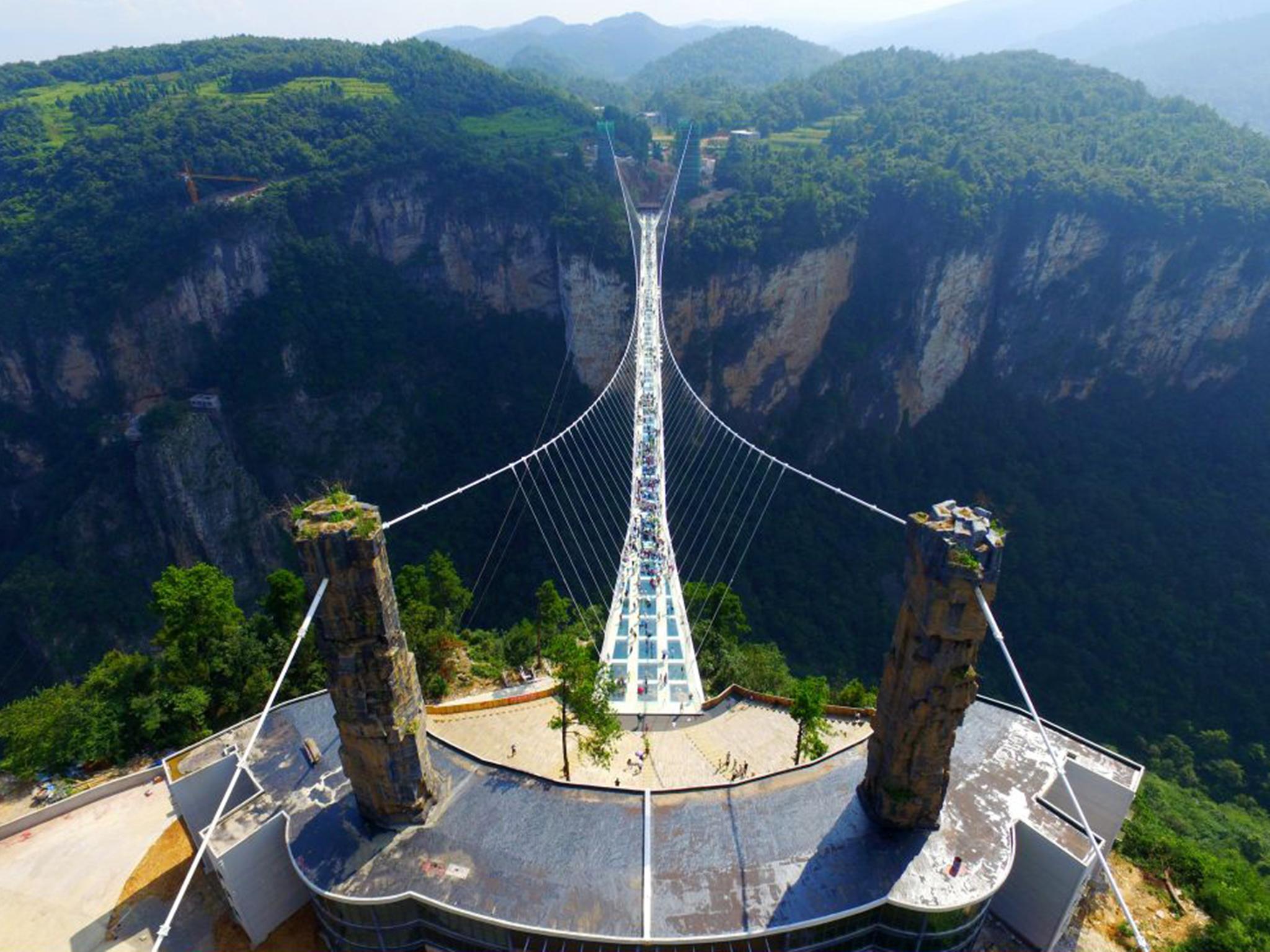 The glass-bottomed bridge in Zhangjiajie, China, is the longest and highest in the world