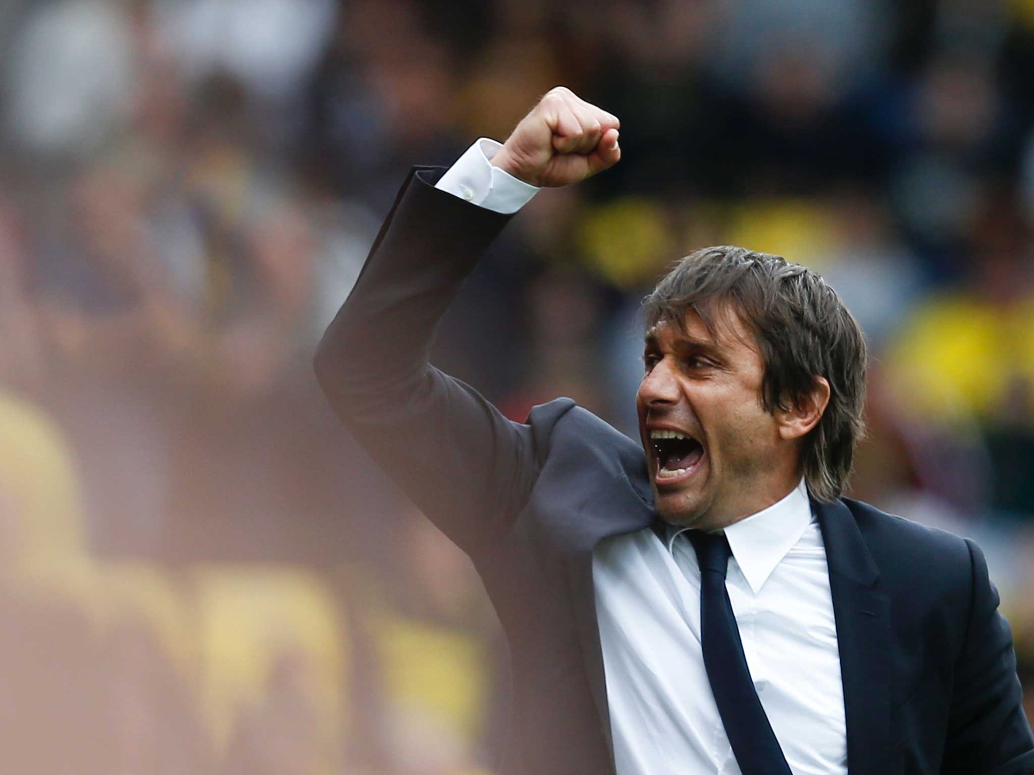 Antonio Conte celebrates on the side-lines at Vicarage Road