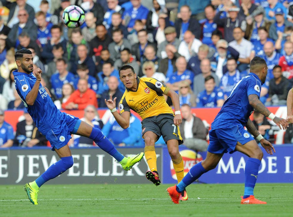 Alexis Sanchez tries to carve out an opening for Arsenal at Leicester City