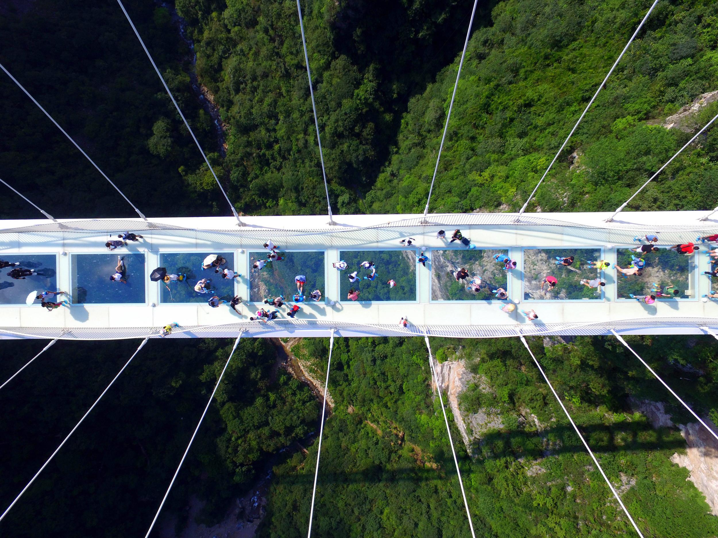 The bridge, which opened to the public on a trial basis on Saturday, spans 430 meters