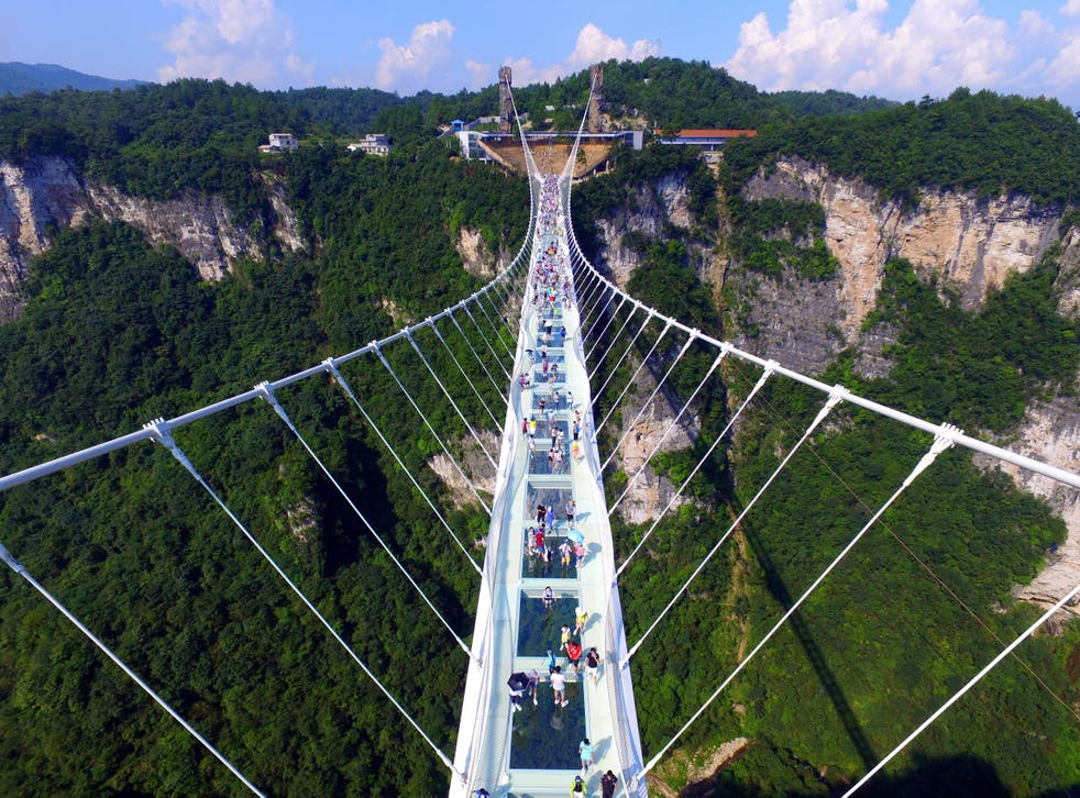 World's highest glassbottomed bridge opens in China Terrifying images