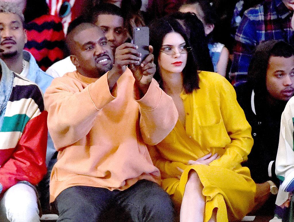 Kanye West and Kendall Jenner attend Tyler the Creator's fashion show for Made LA at L.A. Live on June 11, 2016
