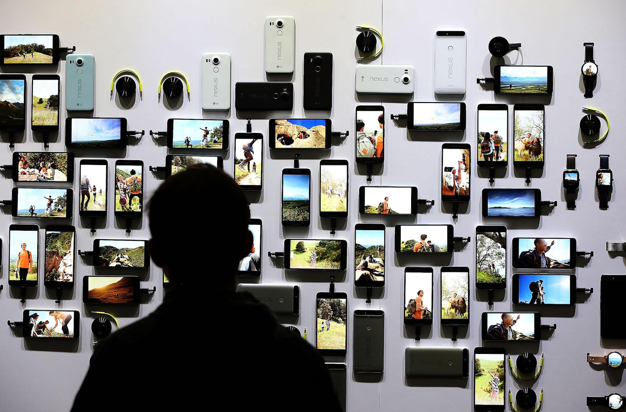 An attendee looks at a display of new Google devices during a Google media event on September 29, 2015 in San Francisco, California