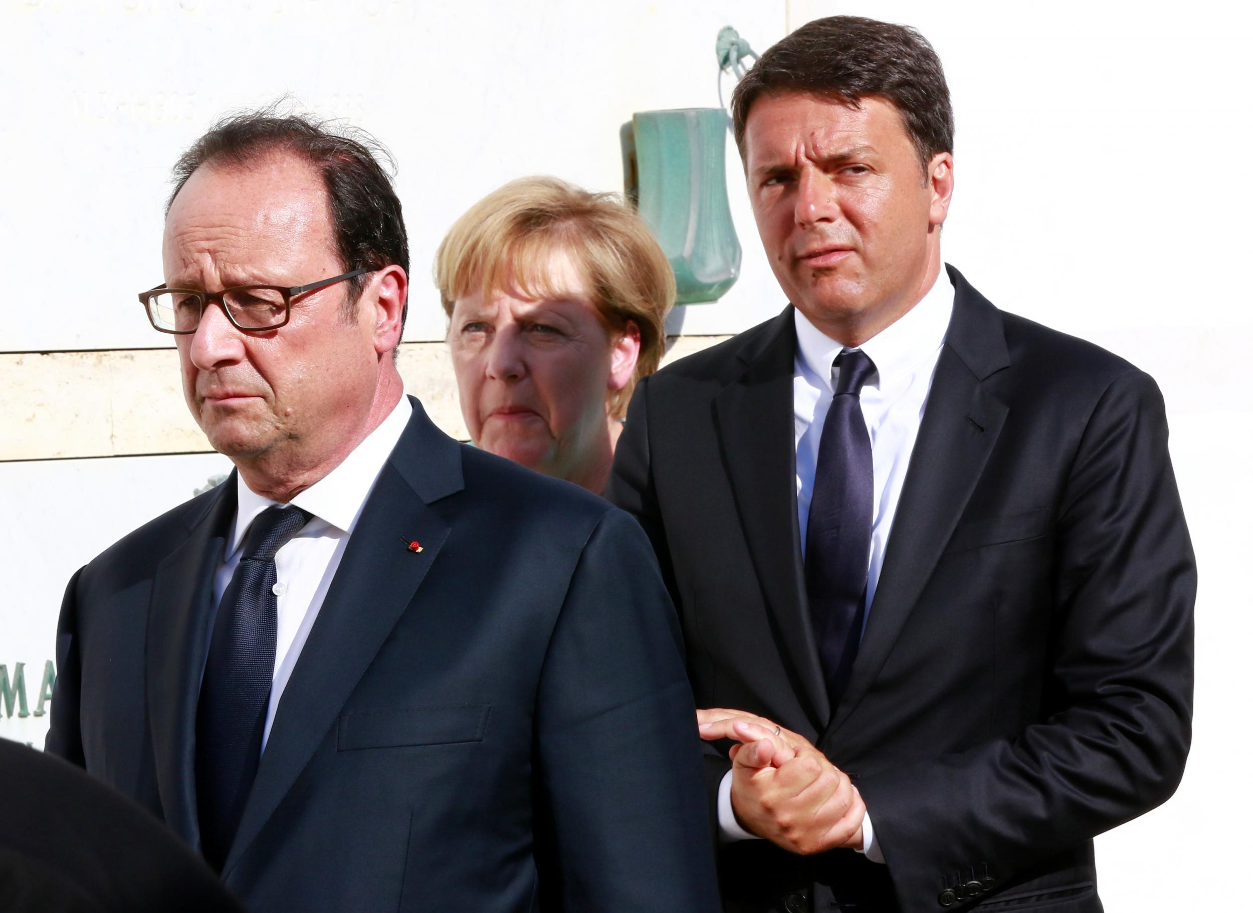 French President Francois Hollande, German Chancellor Angela Merkel and Italian Prime Minister Matteo Renzi in central Italy