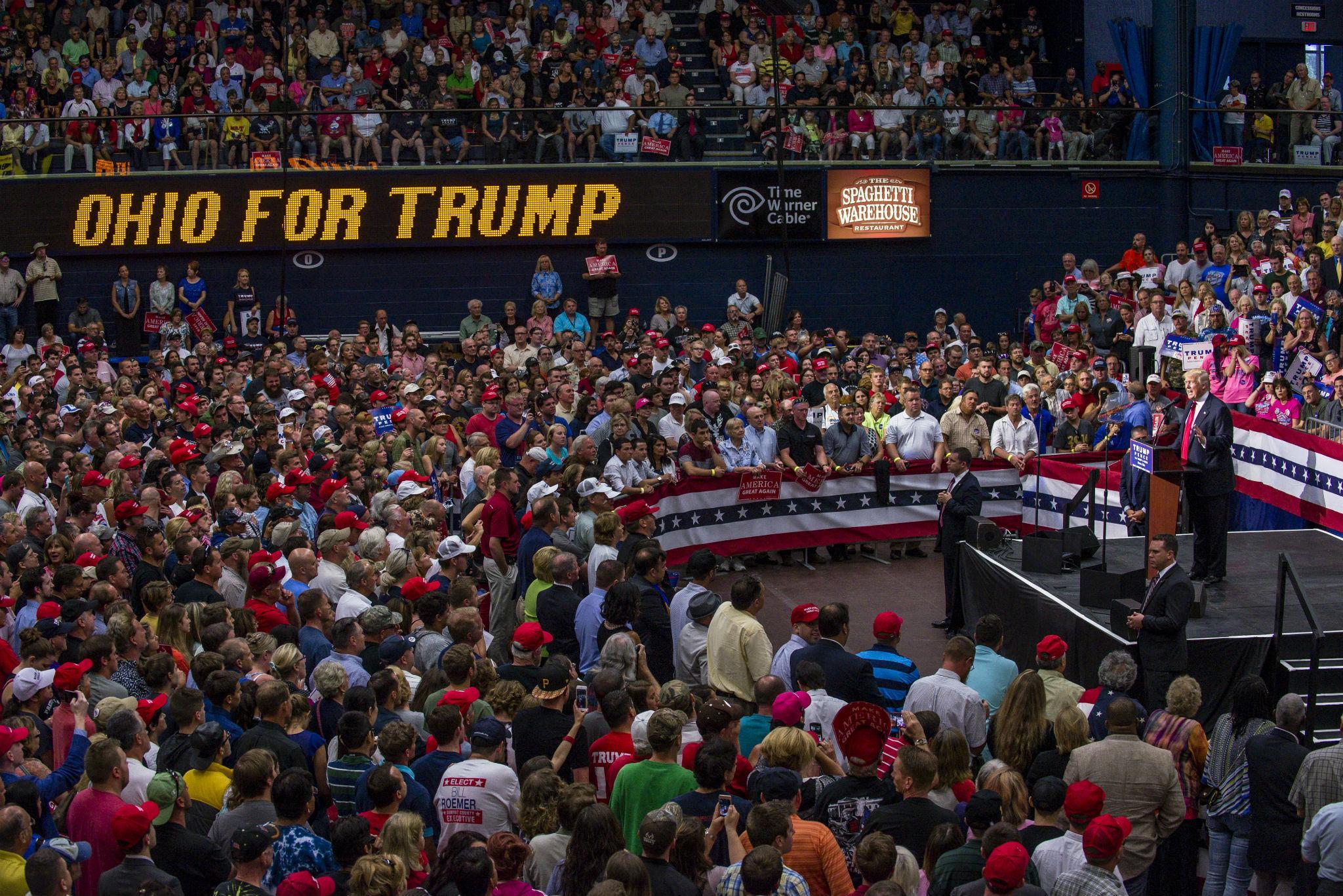 Polls put Donald Trump almost five points behind Hillary Clinton in the crucial swing state of Ohio, where he campaigned on Monday