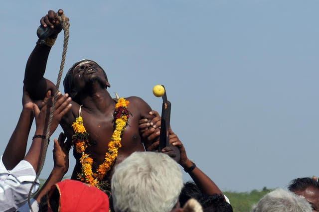 An act of religious devotion in southern India