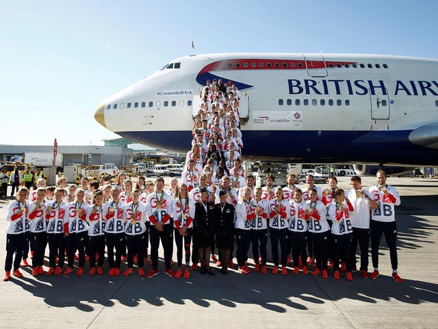 The medal-laden British team arrives at Heathrow from Rio