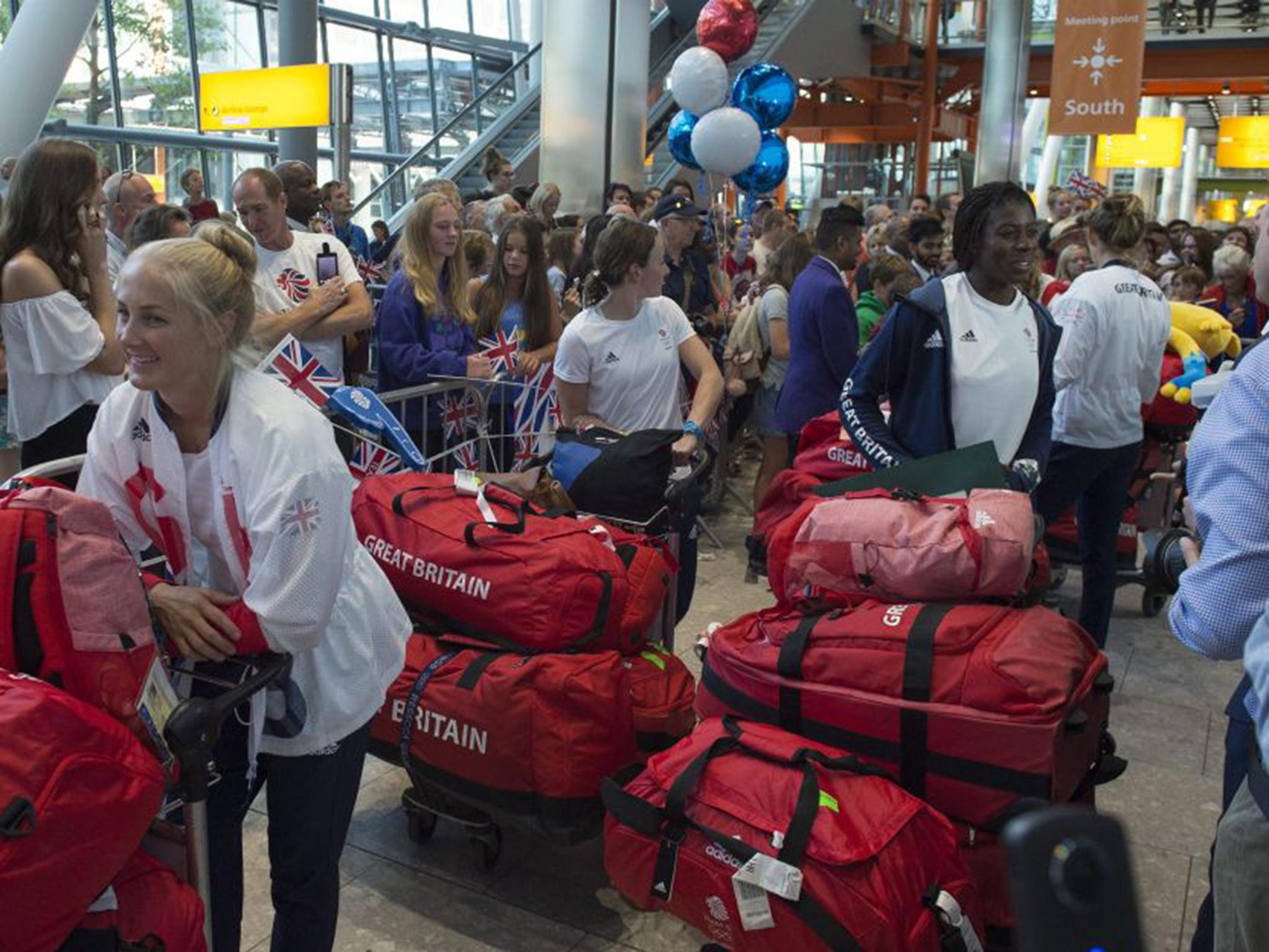 The 400m specialist Christine Ohuruogu (right) chats to people in Heahrow's Terminal