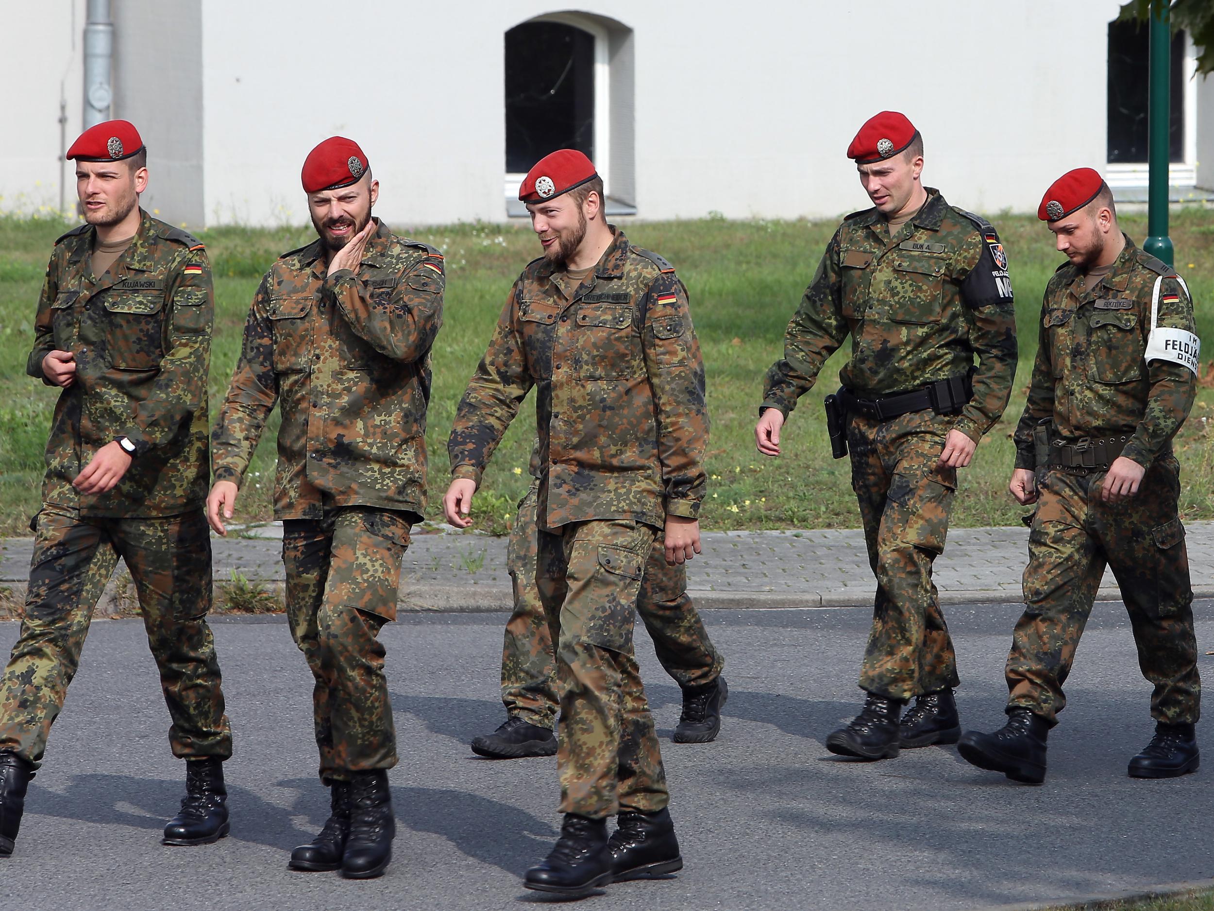 German soldiers walk through the Julius-Leber-Kaserne military barracks