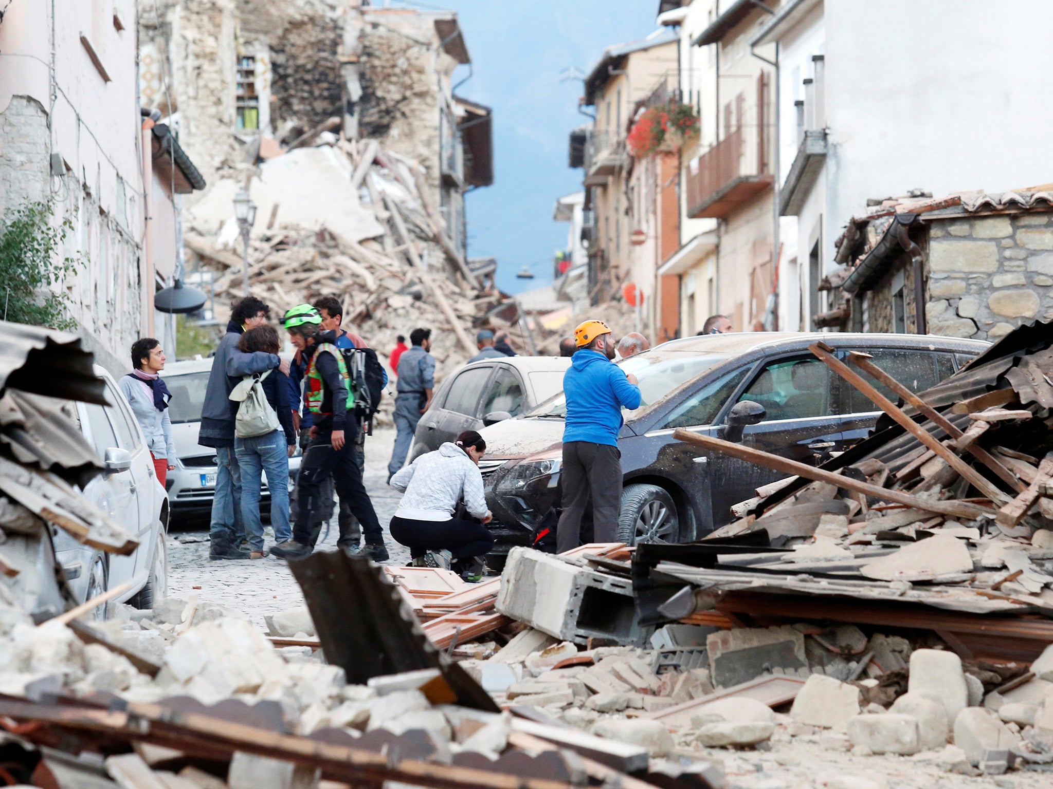 Italy earthquake Eight year old pulled from rubble as death toll