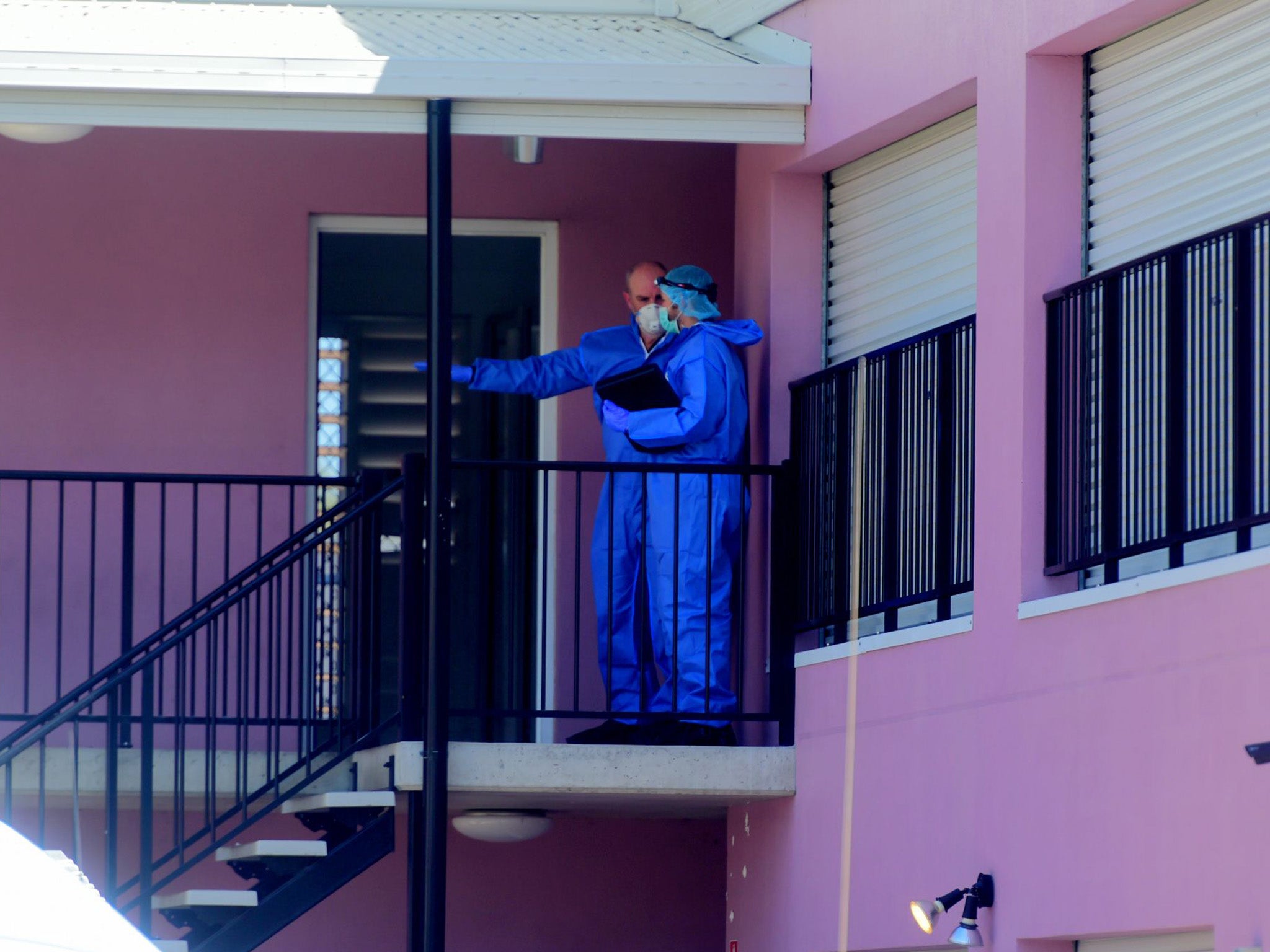 Forensic officers at the hostel in Queensland