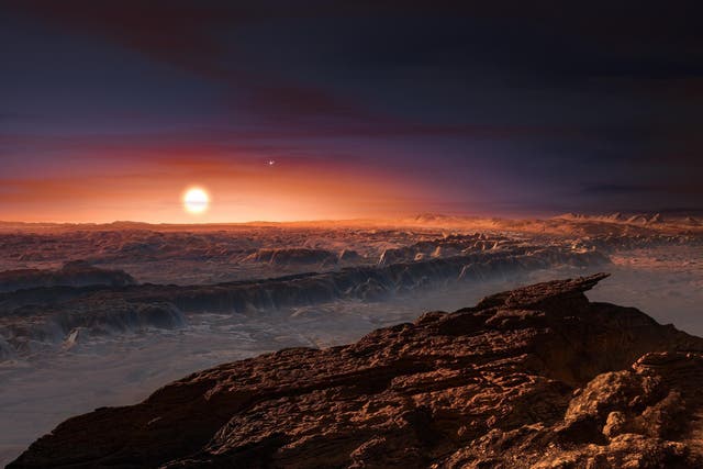 This artist’s impression shows a view of the surface of the planet Proxima b orbiting the red dwarf star Proxima Centauri, the closest star to the Solar System. The double star Alpha Centauri AB also appears in the image to the upper-right of Proxima itself