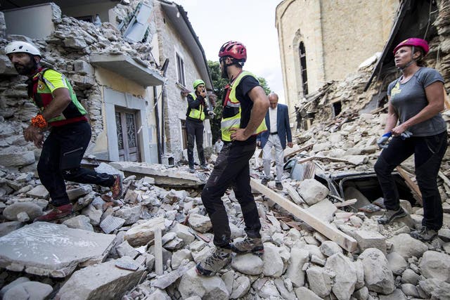 Volounteers work in Amatrice, central Italy where a earthquake struck just after 3:30 a.m