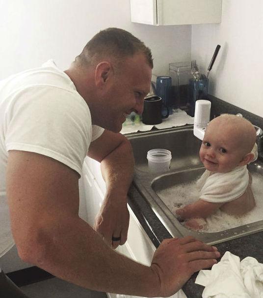 Police Give Bath To Baby Left Covered In Vomit By Drunk