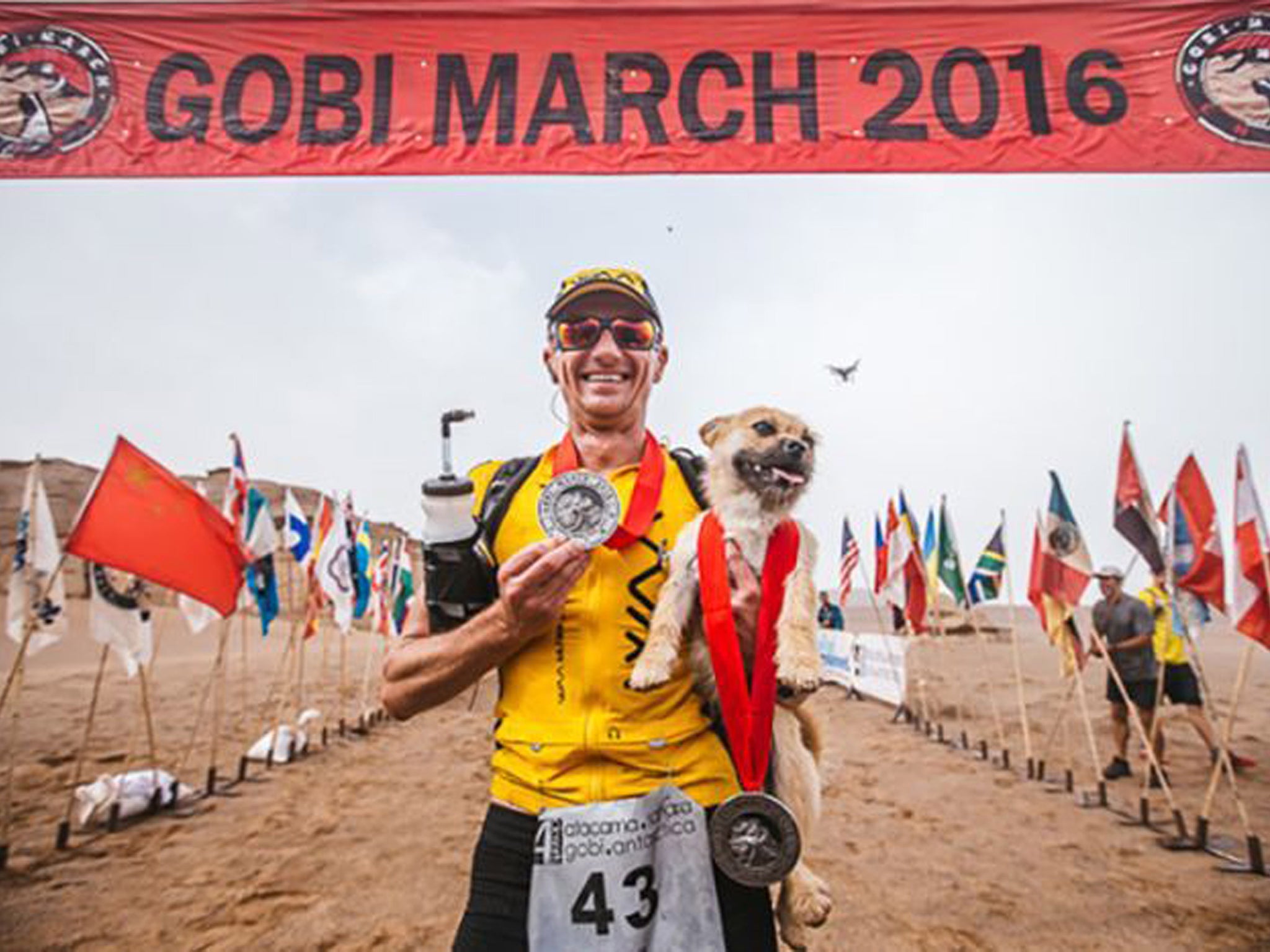 Dion and Gobi together at the ultramarathon finishing line