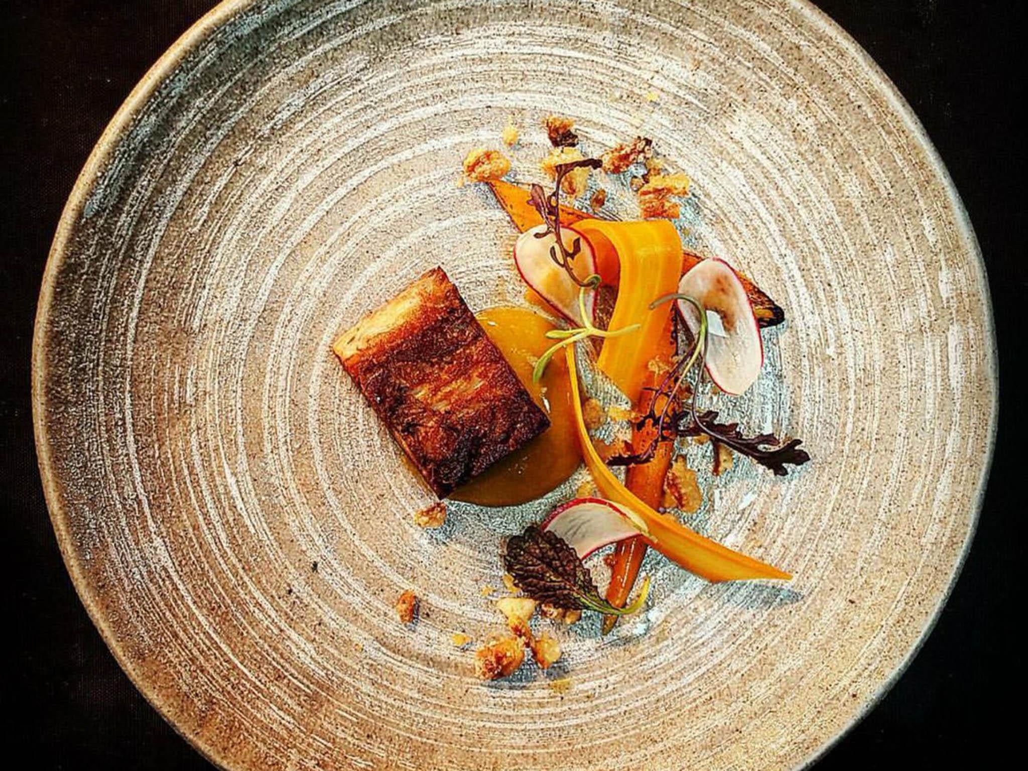 The lightly smoked pork, roast carrots and greengage puree from the summer tasting menu (Twitter/Picture)