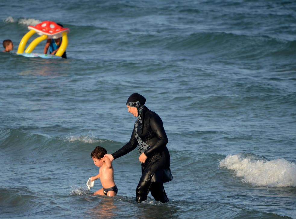 Women wearing Burqinis on certain French beaches can be fined