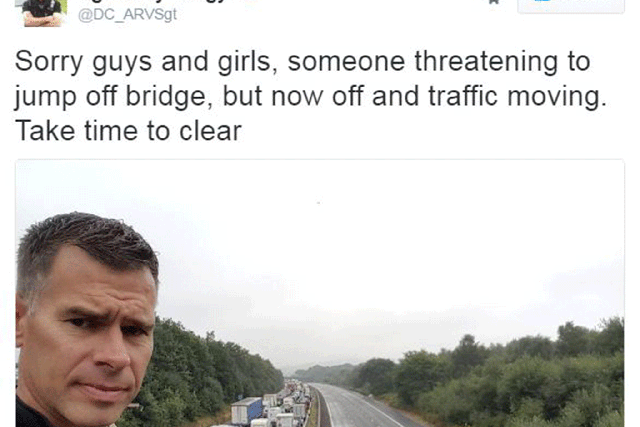 The police officer came under fire for apologising that there had been a suicidal person on an M5 bridge