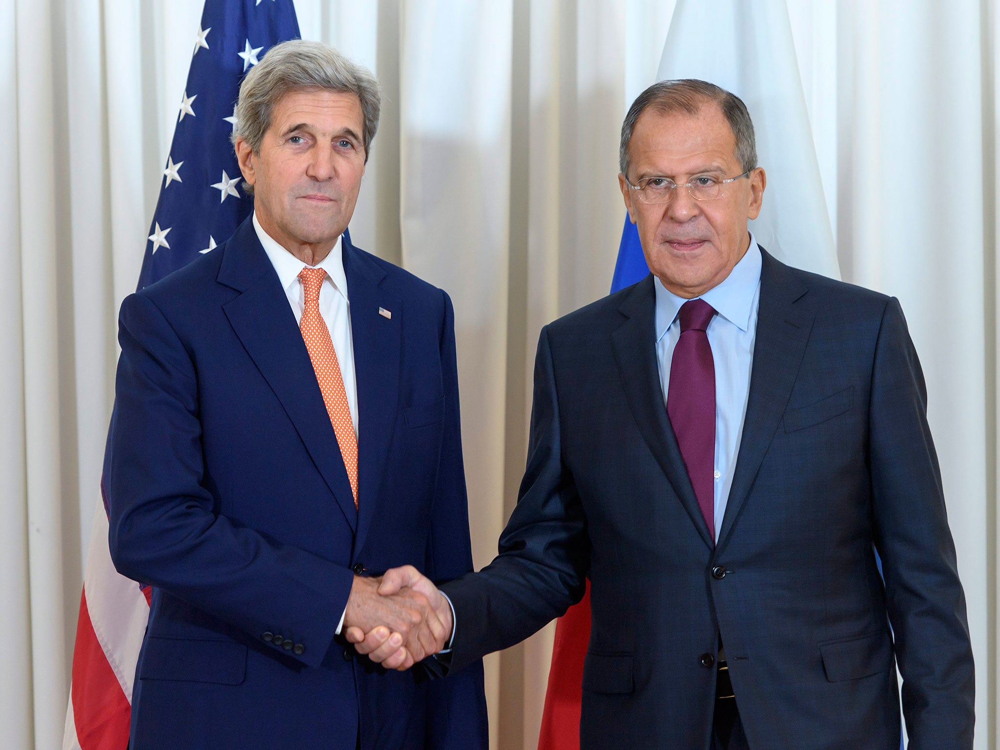 US Secretary of State John Kerry (left) and Russian Foreign Minister Sergei Lavrov holding talks