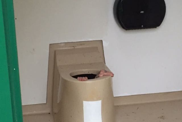 Cato Berntsen Larsen shown here stuck inside the toilet