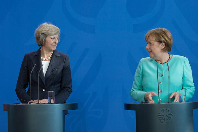 Theresa May and Angela Merkel at a news conference in Berlin last month: Getty