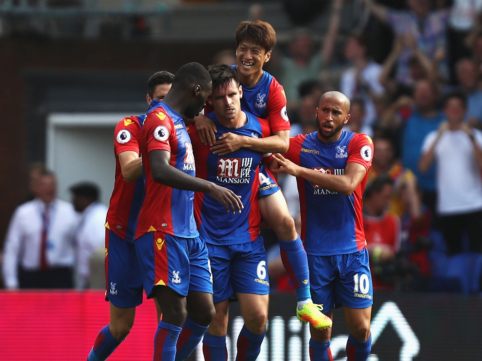 Palace's players celebrate Dann's late equaliser
