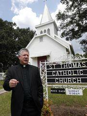 Rev. Greg Plata of the St. Thomas Catholic Church in Lexington