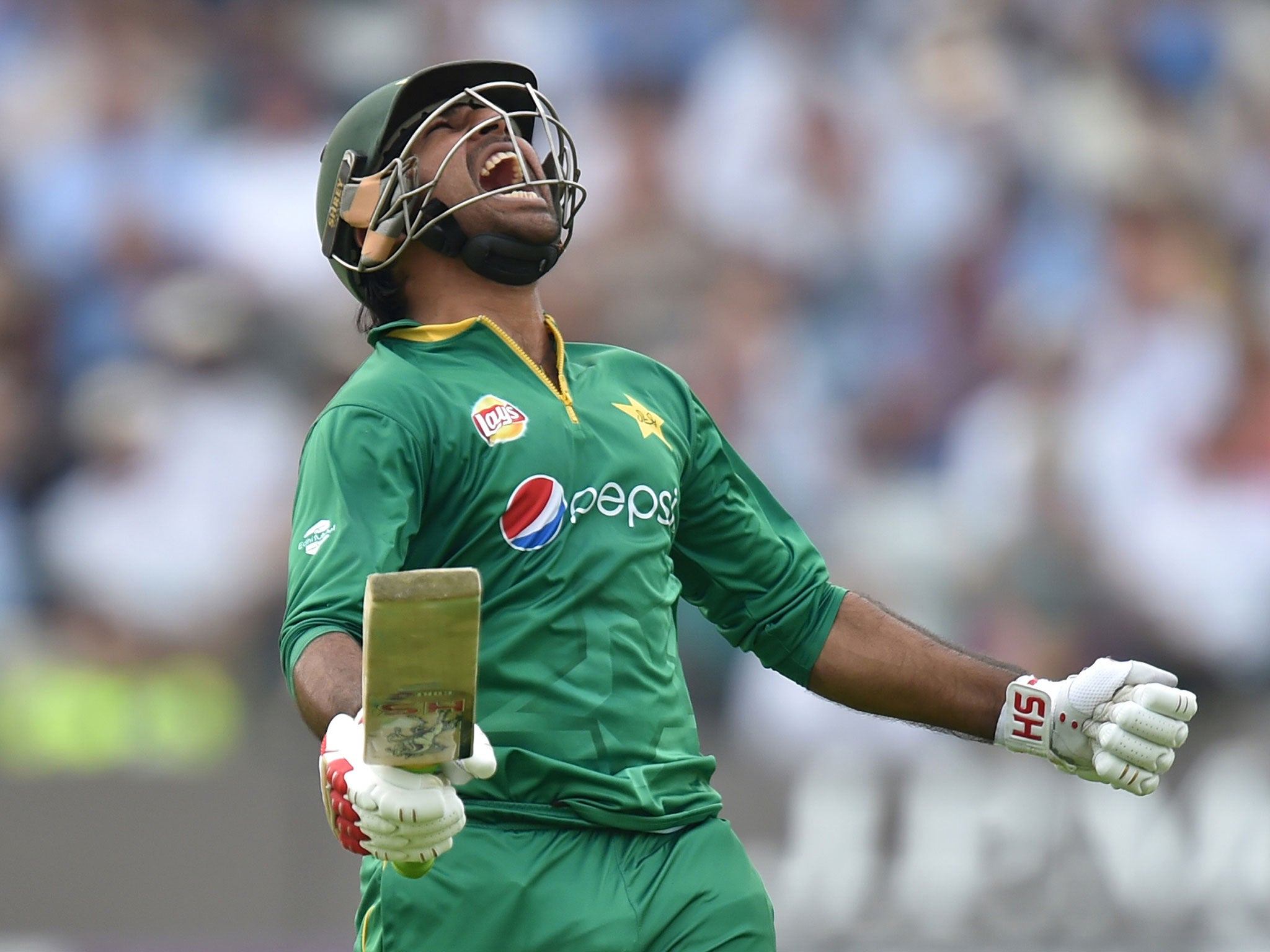 Pakistan's Sarfraz Ahmed celebrates reaching his century during play in the second one day internationa