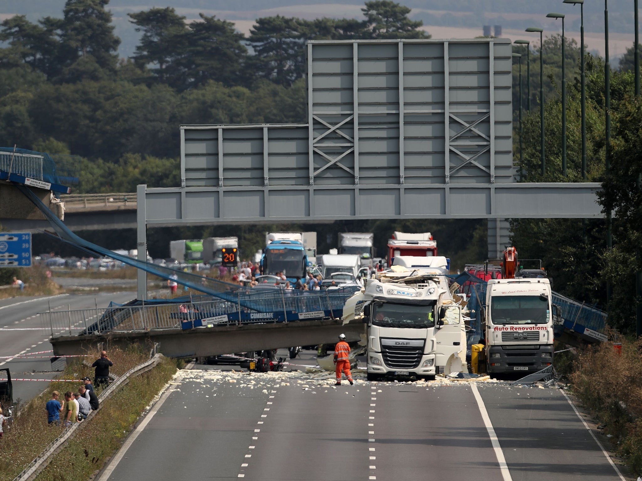 The bridge came down between junctions three and four shortly after noon on Saturday