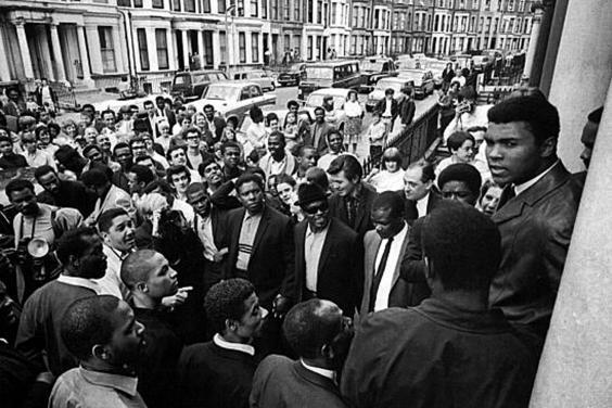 Muhammad Ali visits the home of carnival founder Rhaune Laslett in 1966 (Getty)