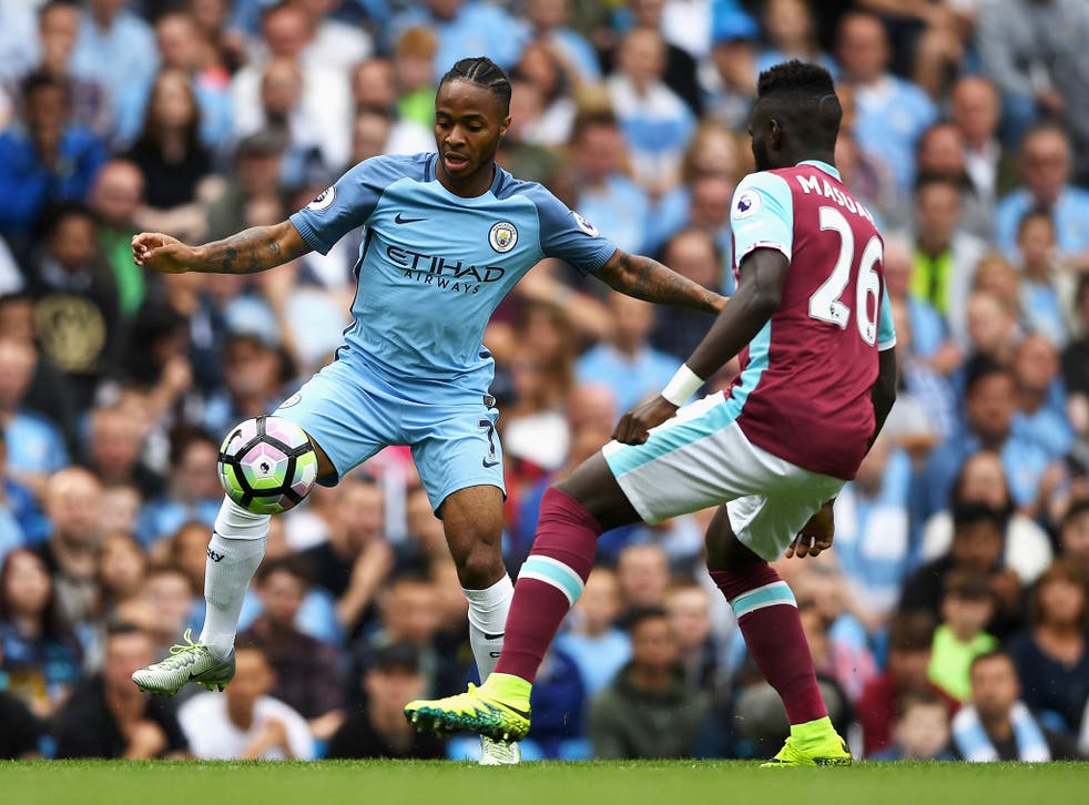 City's Sterling takes on Hammers full-back Masuaku early on