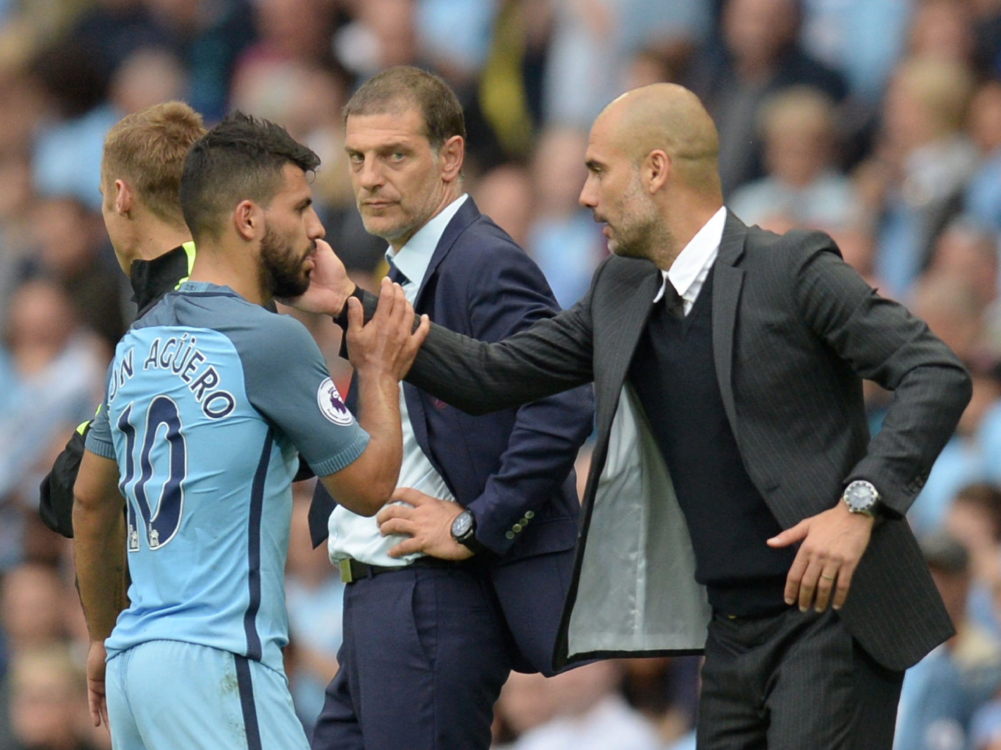 Guardiola acknowledges Aguero as he leaves the Etihad pitch