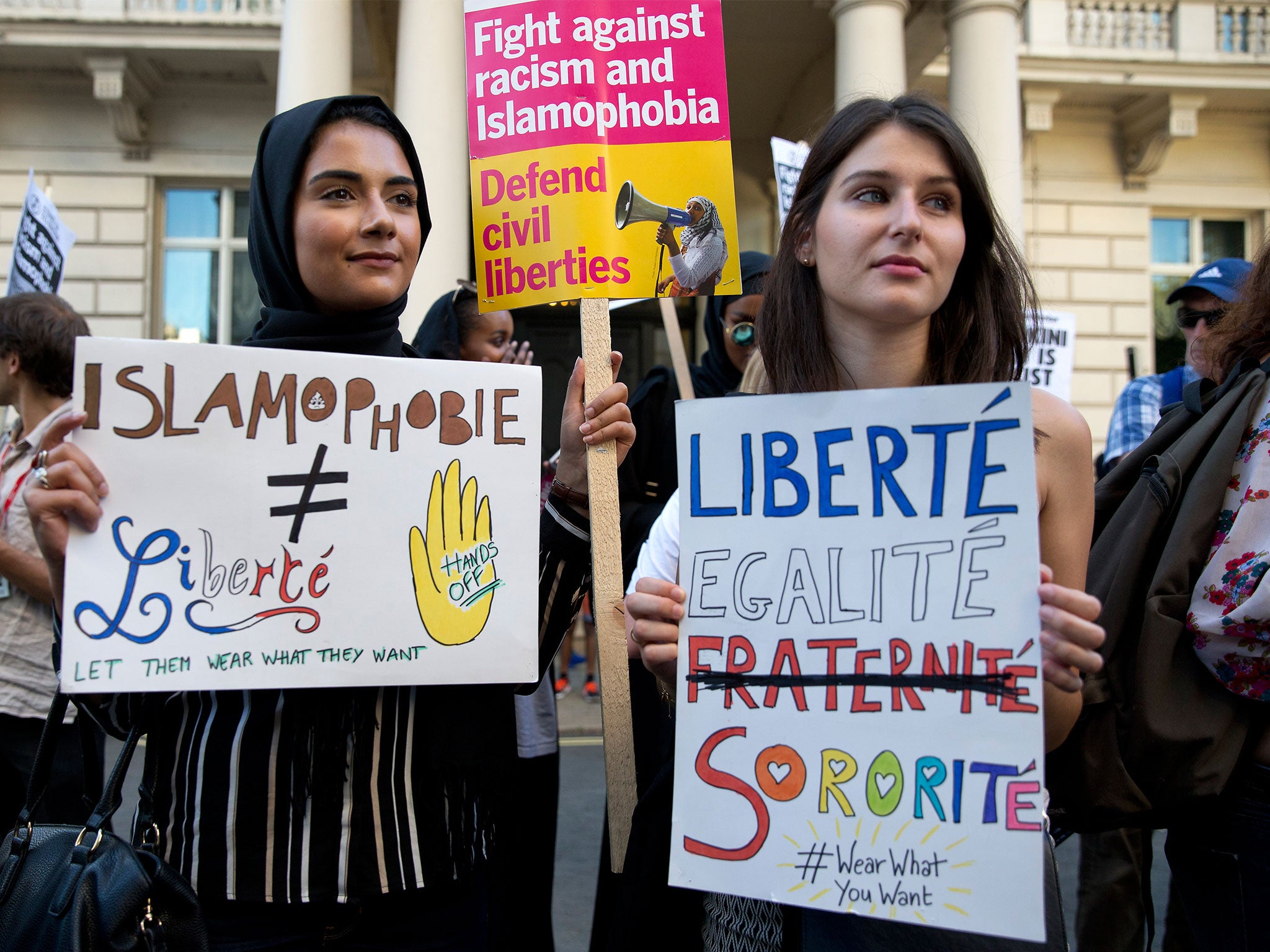 Women join a demonstration organised by 'Stand up to Racism' outside the French Embassy in London on August 26, against the Burkini ban on French beaches