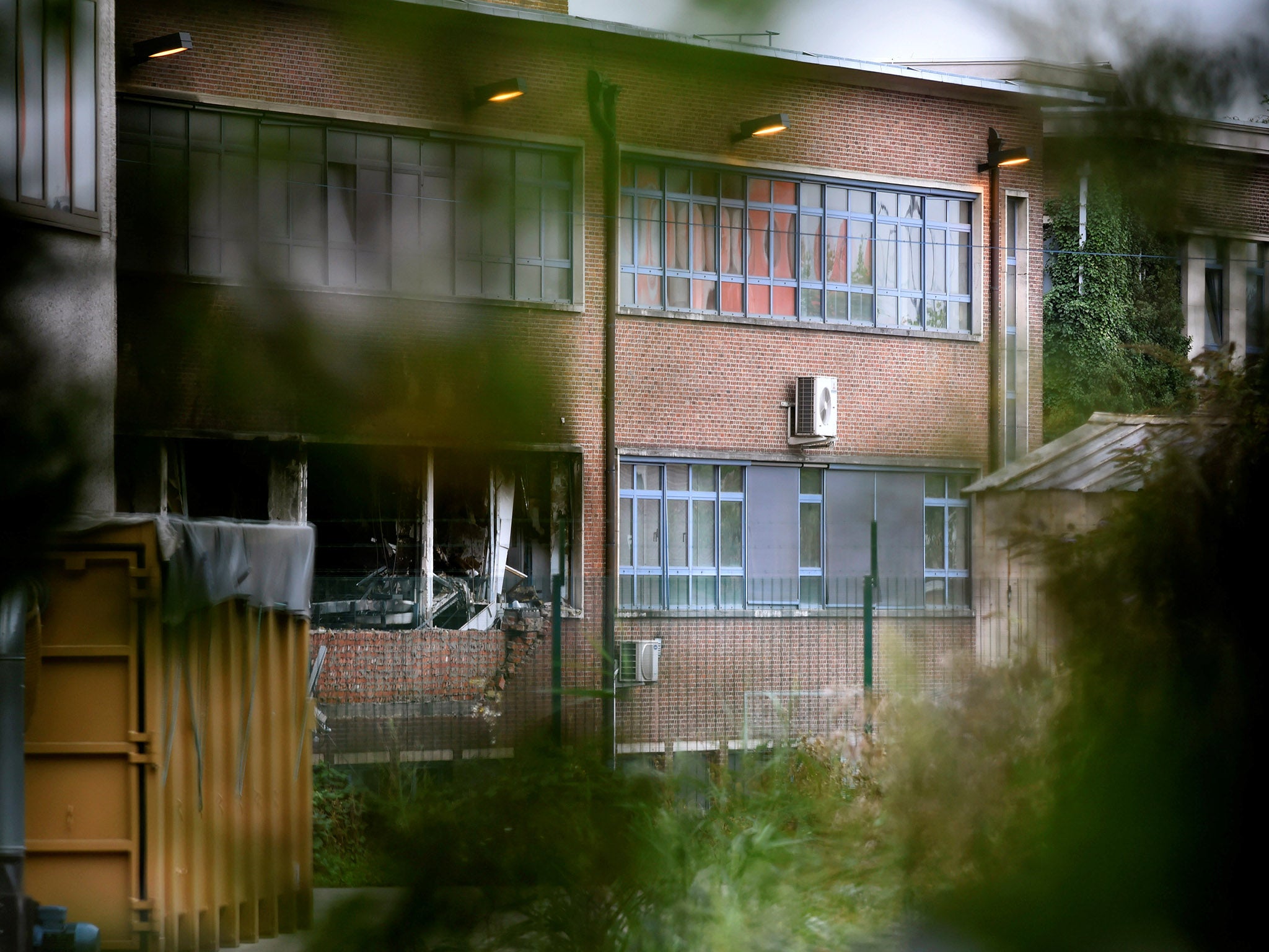 The partially destroyed front of Belgium's National Institute of Criminology following the attack