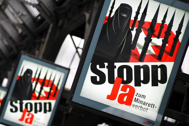 Posters for the right-wing Swiss People’s Party, which supports a ban on both mosque minarets and face coverings