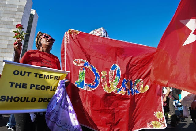 Protestors gather in Brasilia in support of Dilma Rousseff